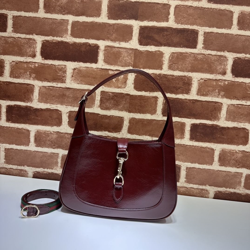 G*u*i top handle bags